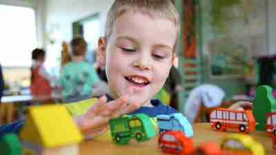 A boy who has a narrow interest in toy trucks could be exhibiting symptoms formerly associated with Asperger's syndrome.